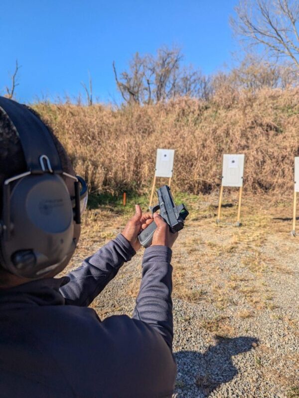 pistol being reloaded