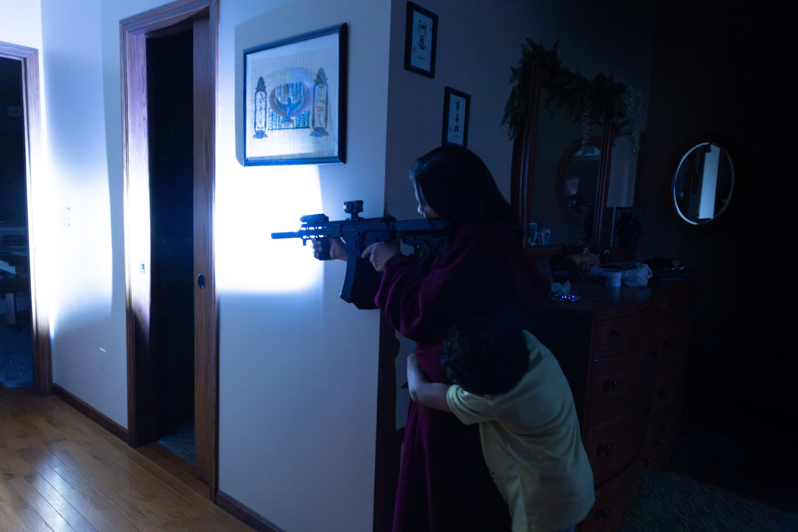 Woman clearing house with AR